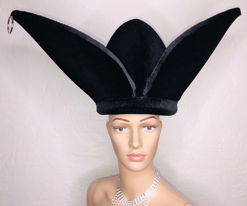 mannequin in black velvet hat with vee shape