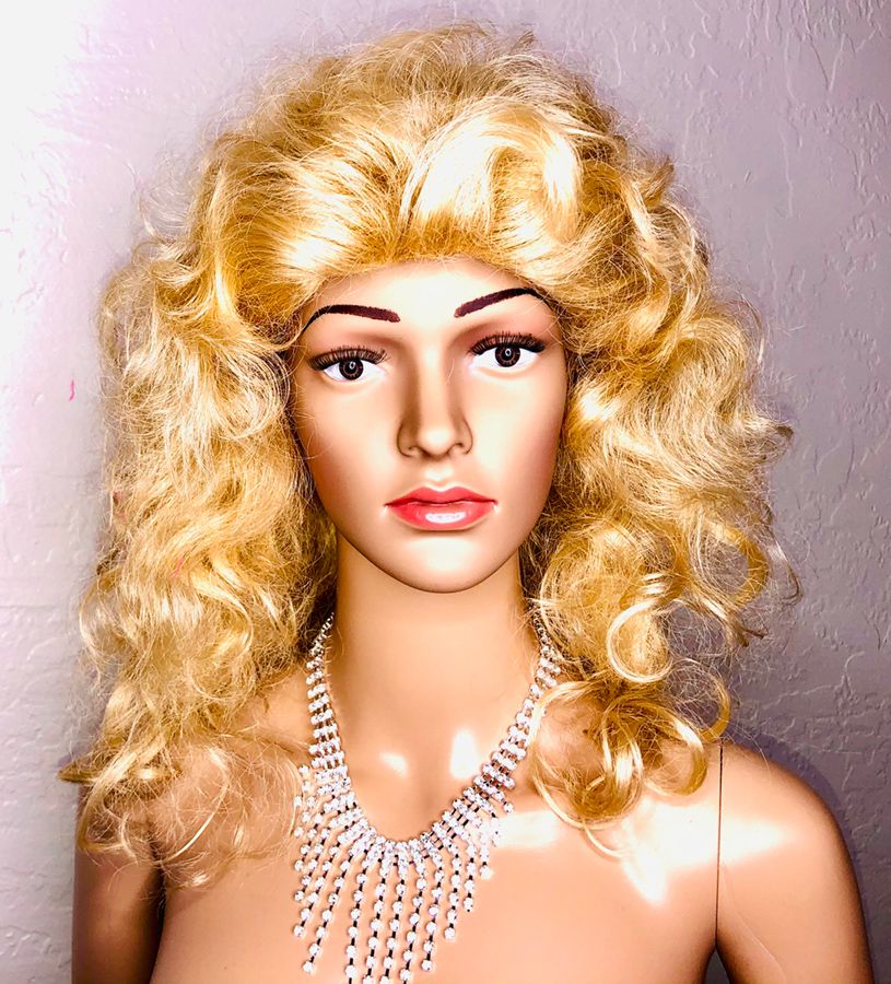mannequin in glamorous blonde curly wig