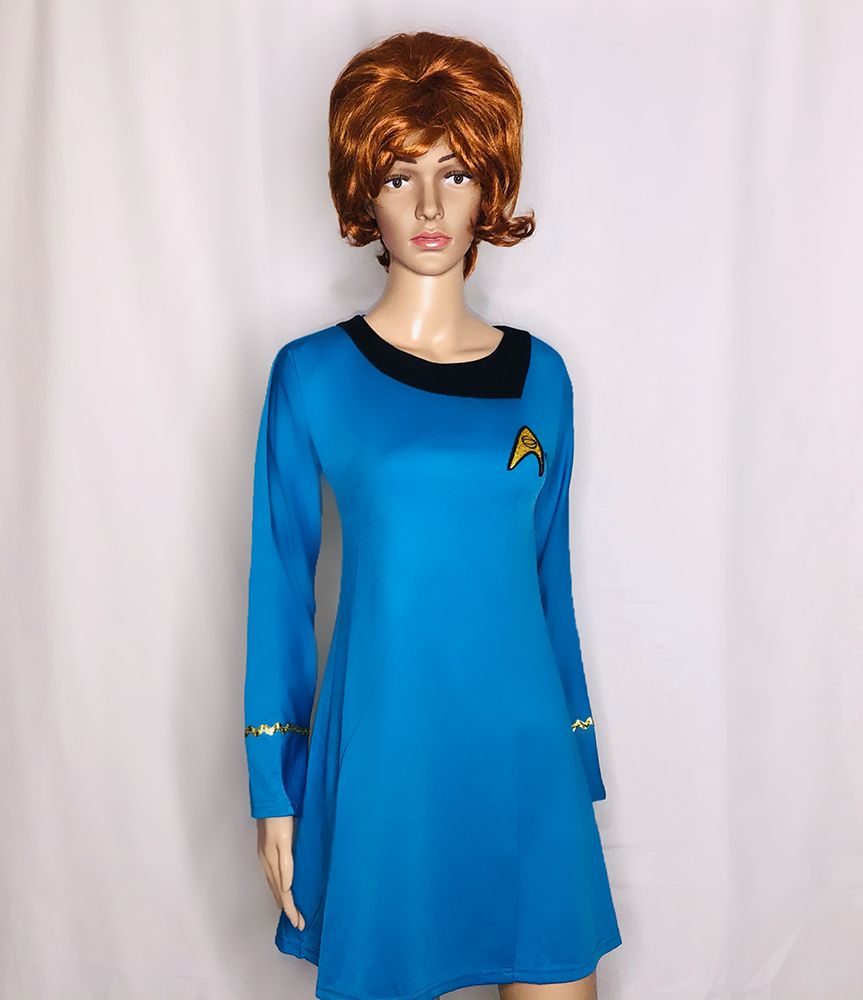 mannequin in blue star trek dress with insignia, and black trim around neckline