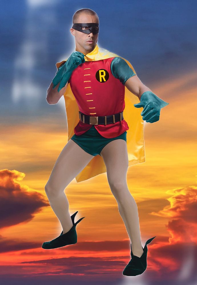 model in action pose in robin costume of white tights, green shorts and sleeves, with red vest and black mask over a sunset background